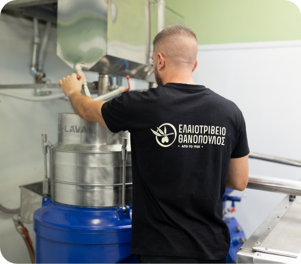 A member of the Thanopoulos Olive Mill team working at the separator